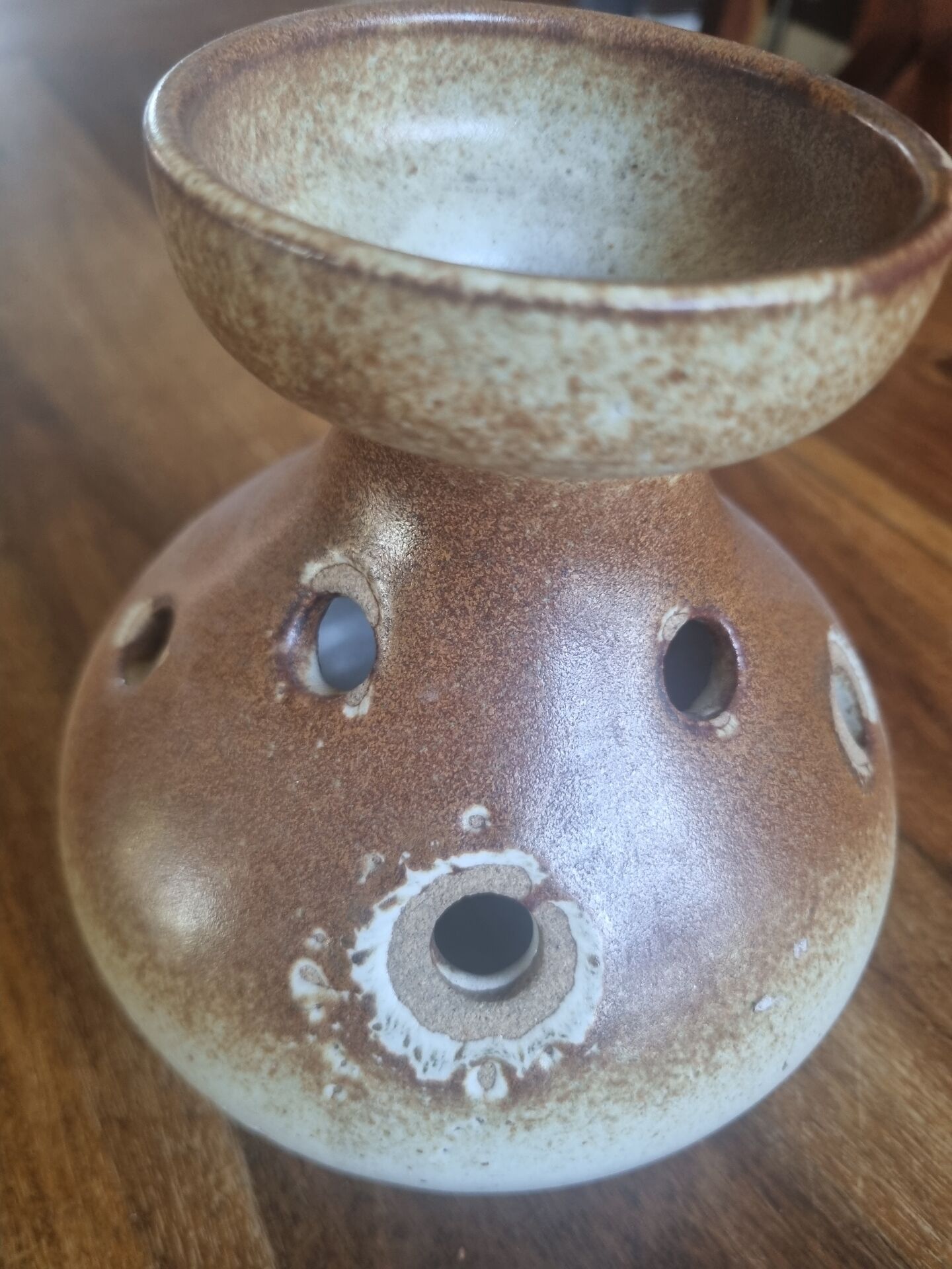 Stoneware vase with flower spikes
