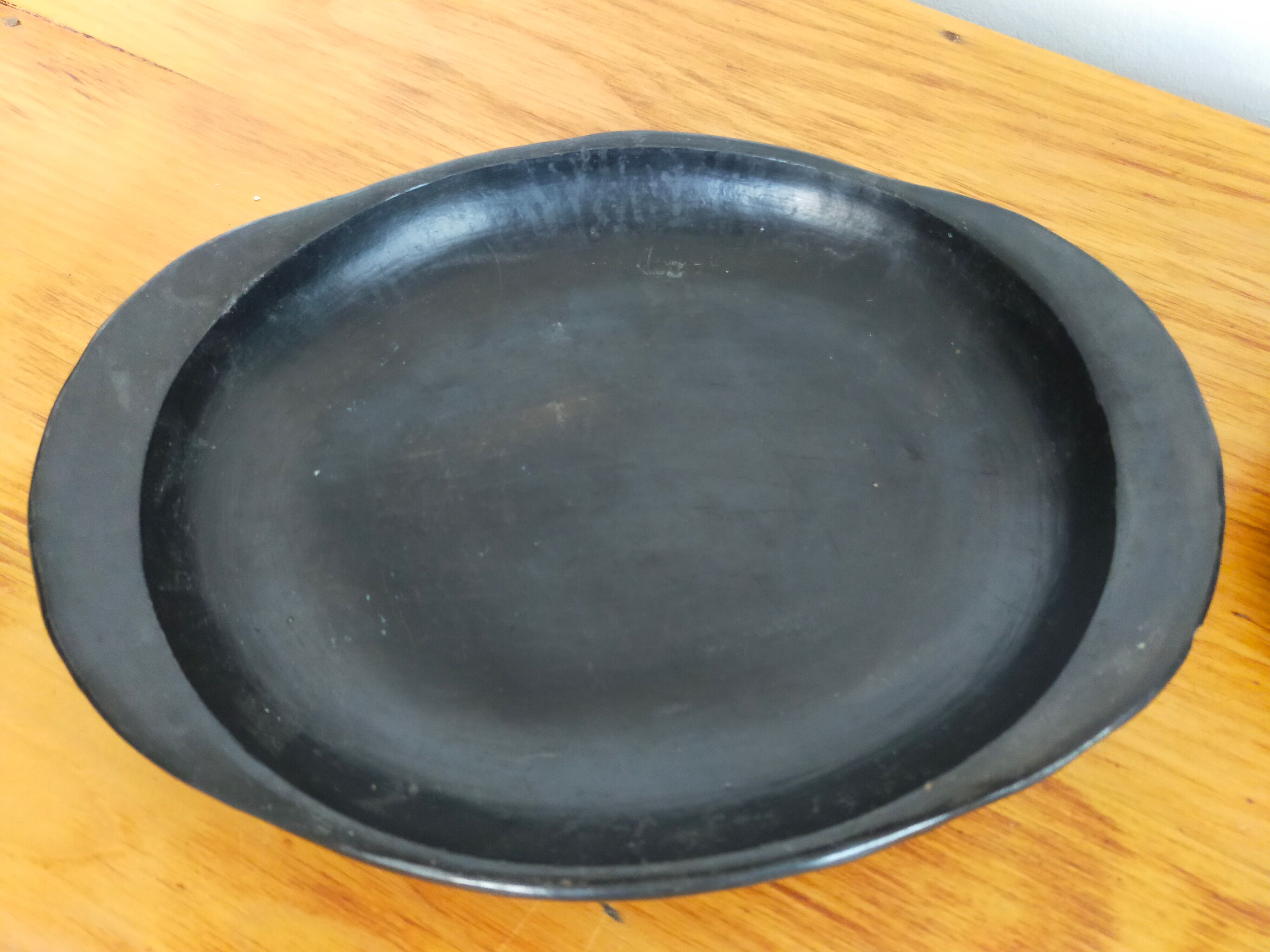 Terracotta service painted in black saucer cups and top