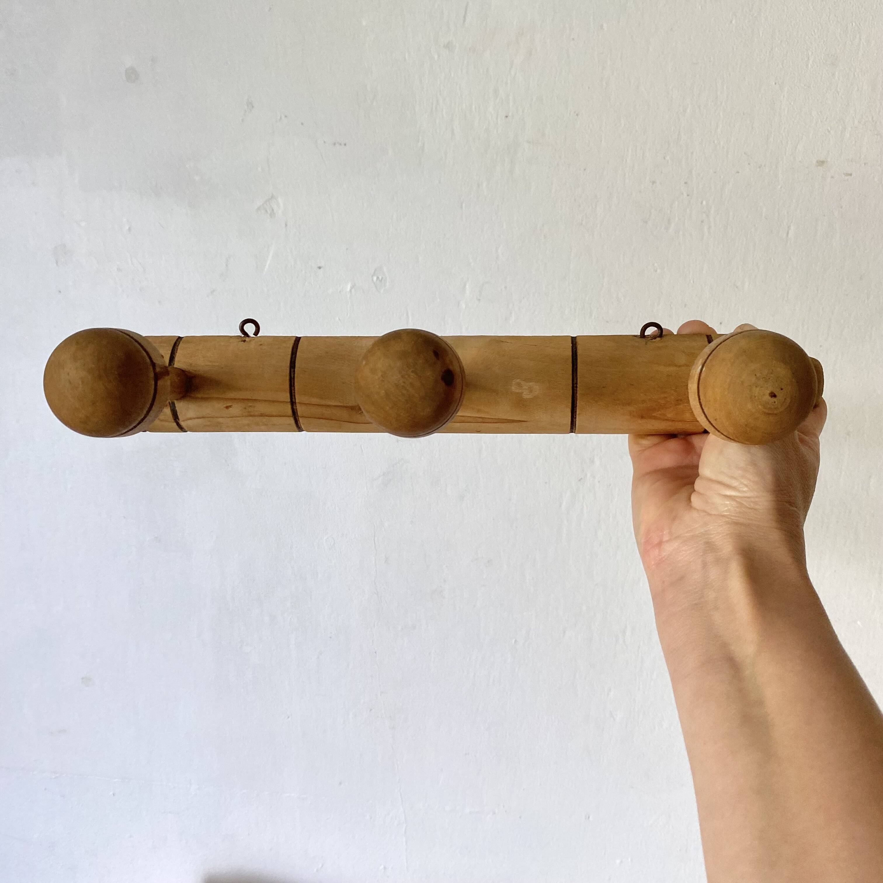 Turned wooden wall coat rack with 3 hooks