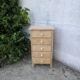 Natural wood chest of drawers
