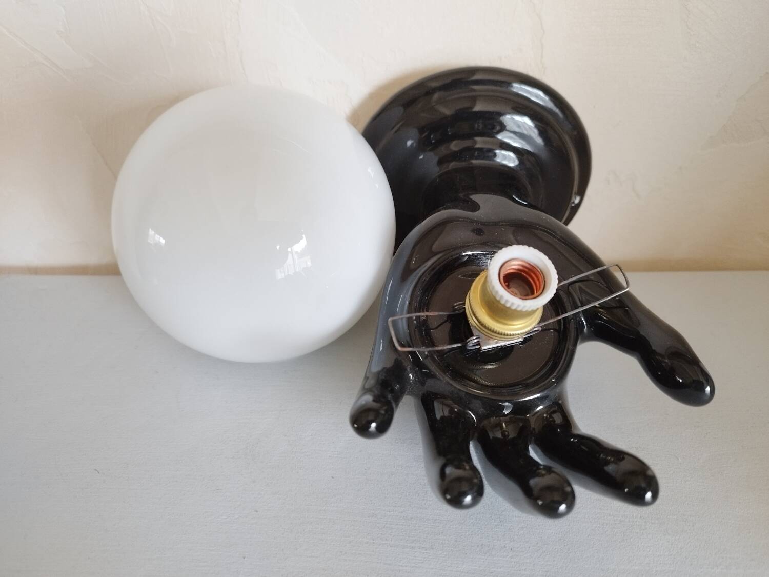 Hand-shaped wall light