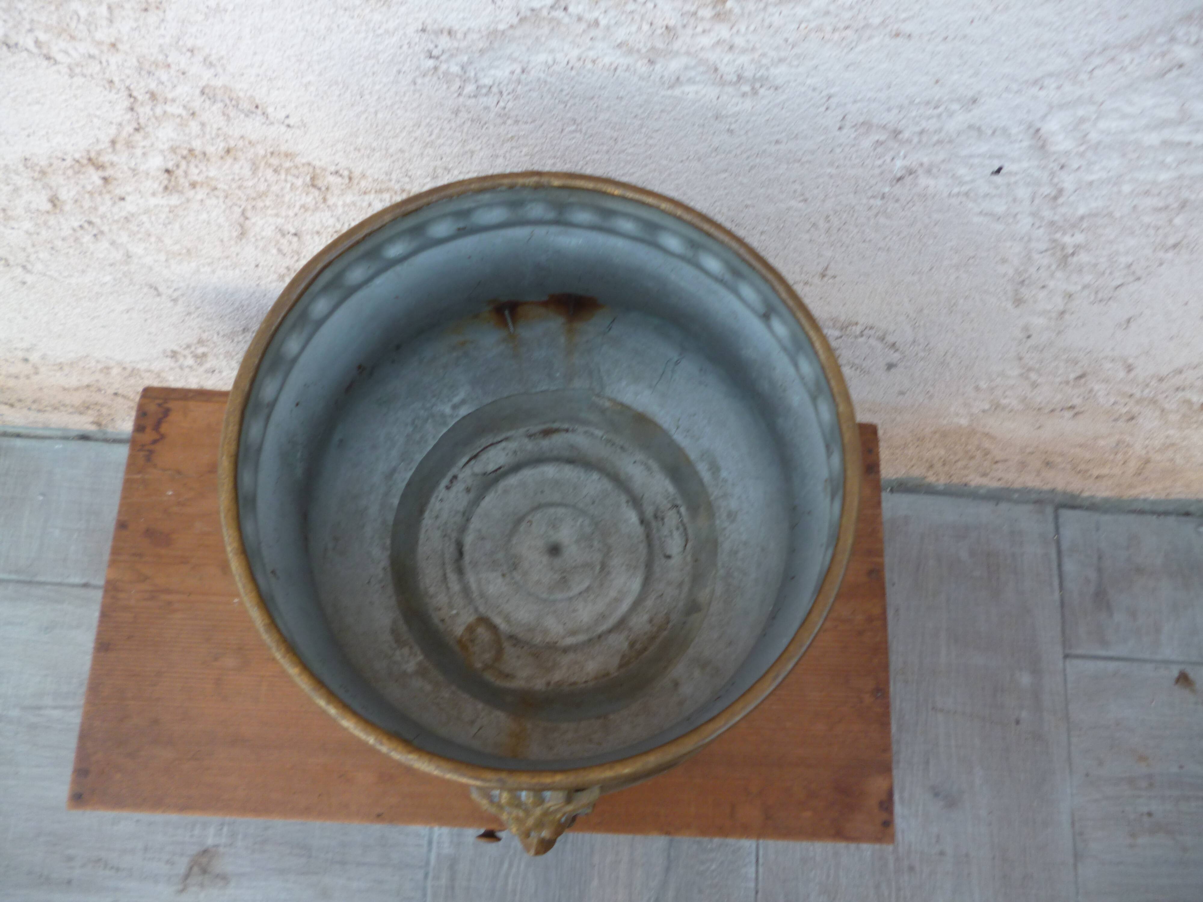 Antique lion heads brass pot cover
