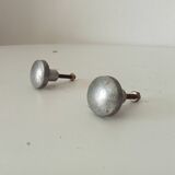 Pair of antique solid aluminium furniture handles.
