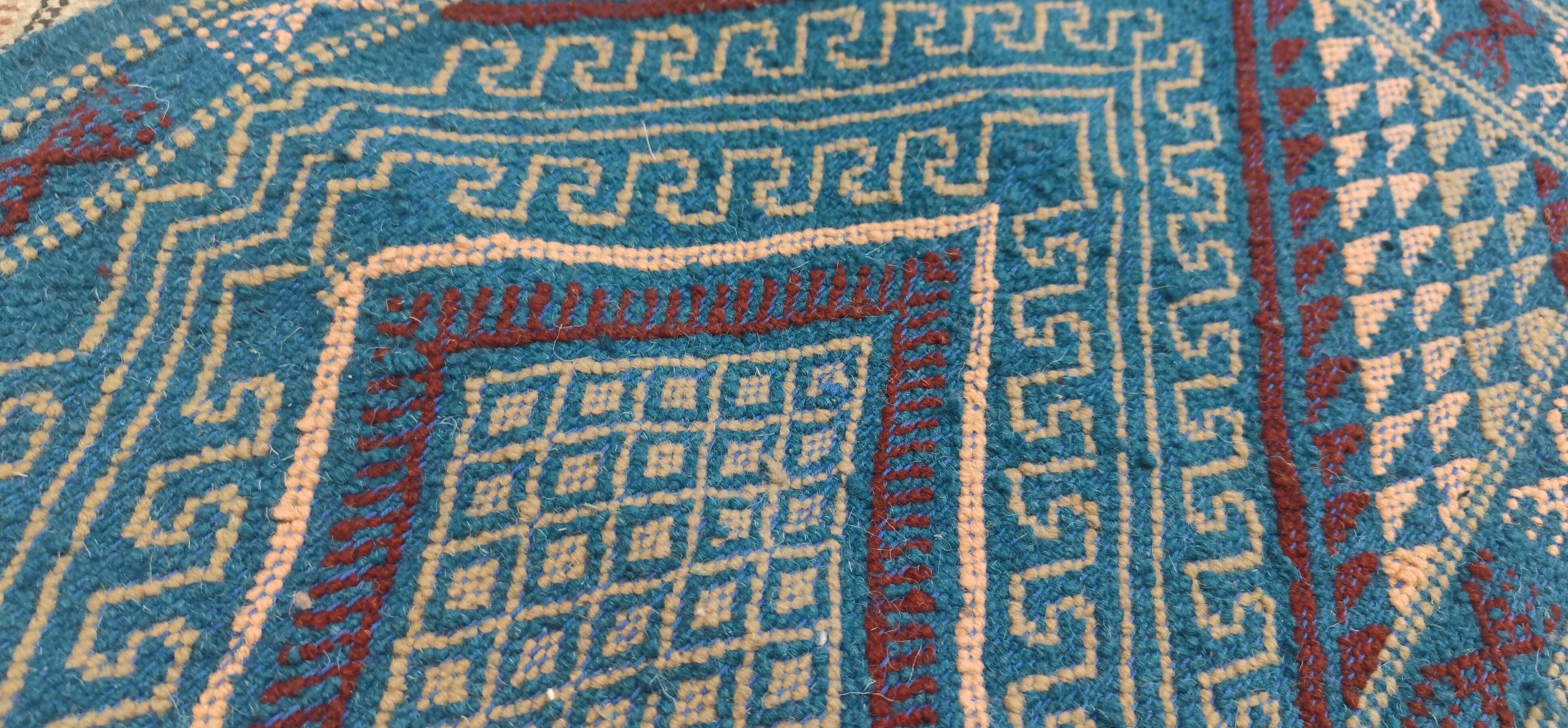Handmade blue mergoum rug in natural wool