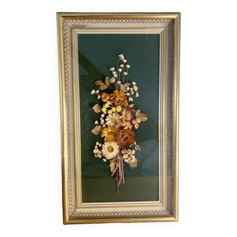 Vintage frame with dried flower decorations