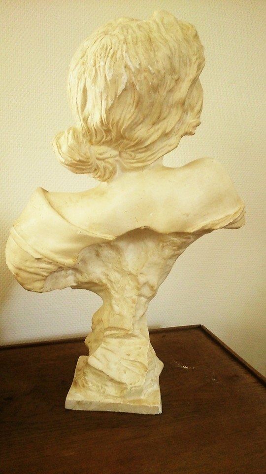 Old plaster bust of woman