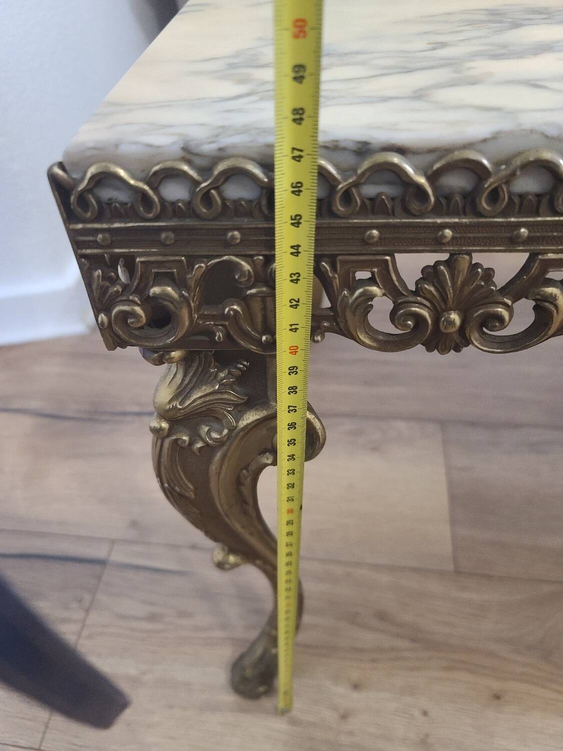 Marble coffee table with brass legs