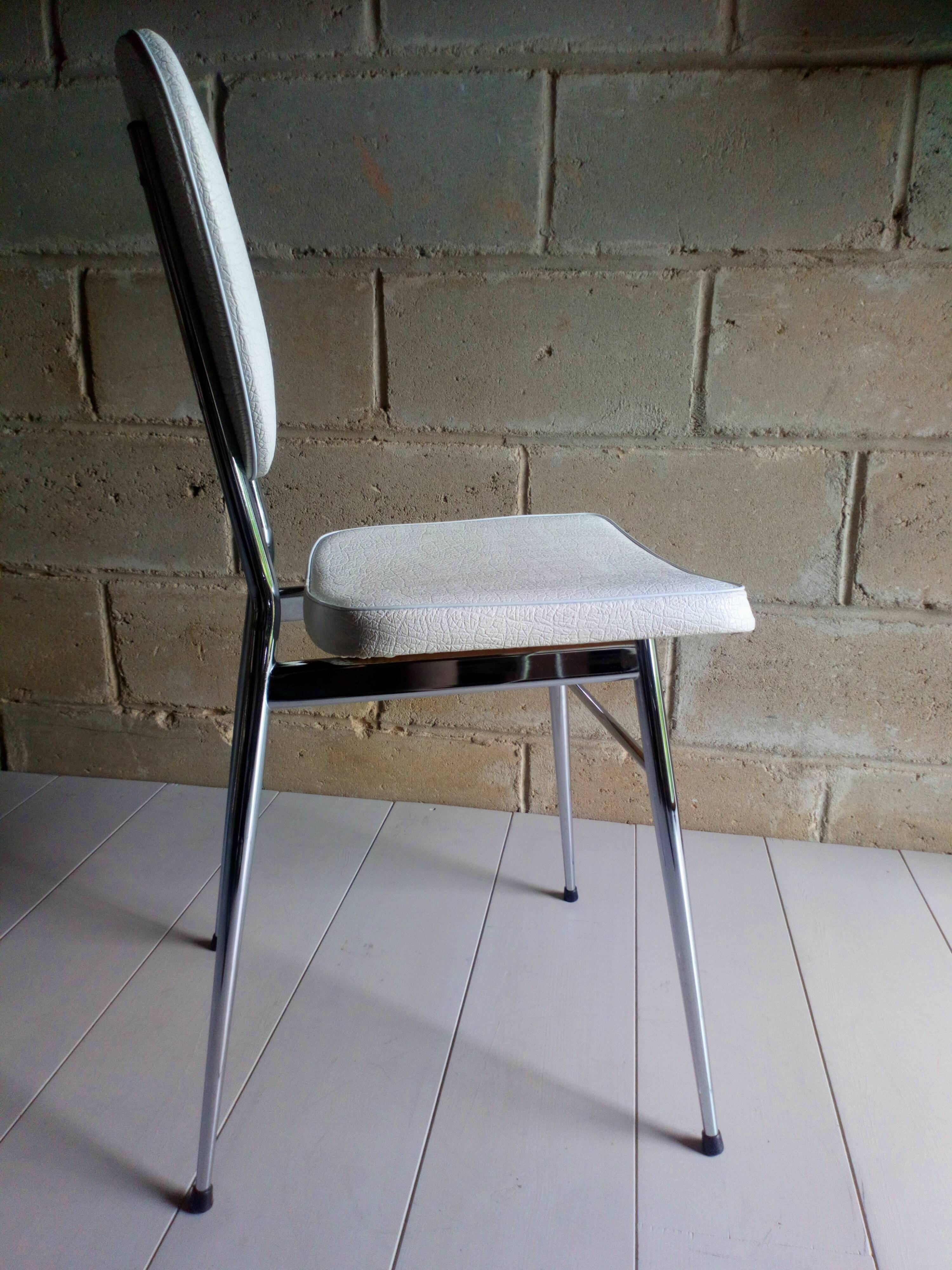 Pair of chrome and white 1960 skaï chairs