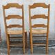 Paire de chaises paillées vintage en merisier