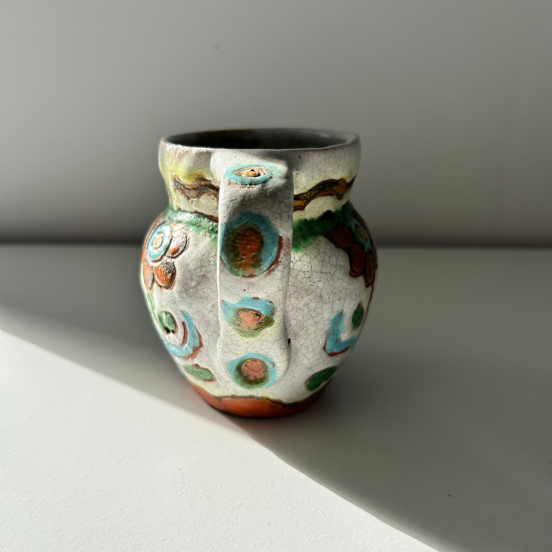 Small floral jug signed