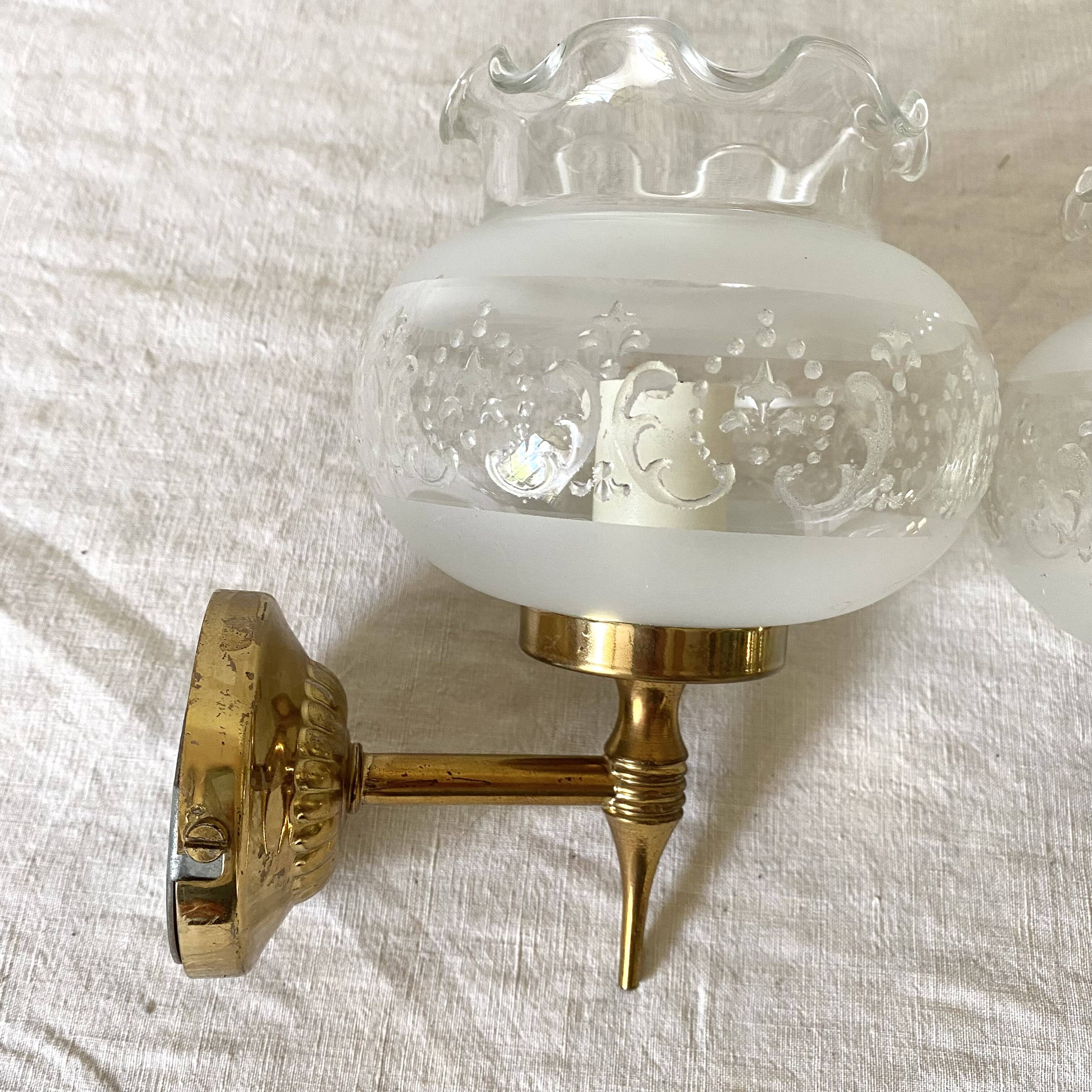 Pair of glass and brass wall lights
