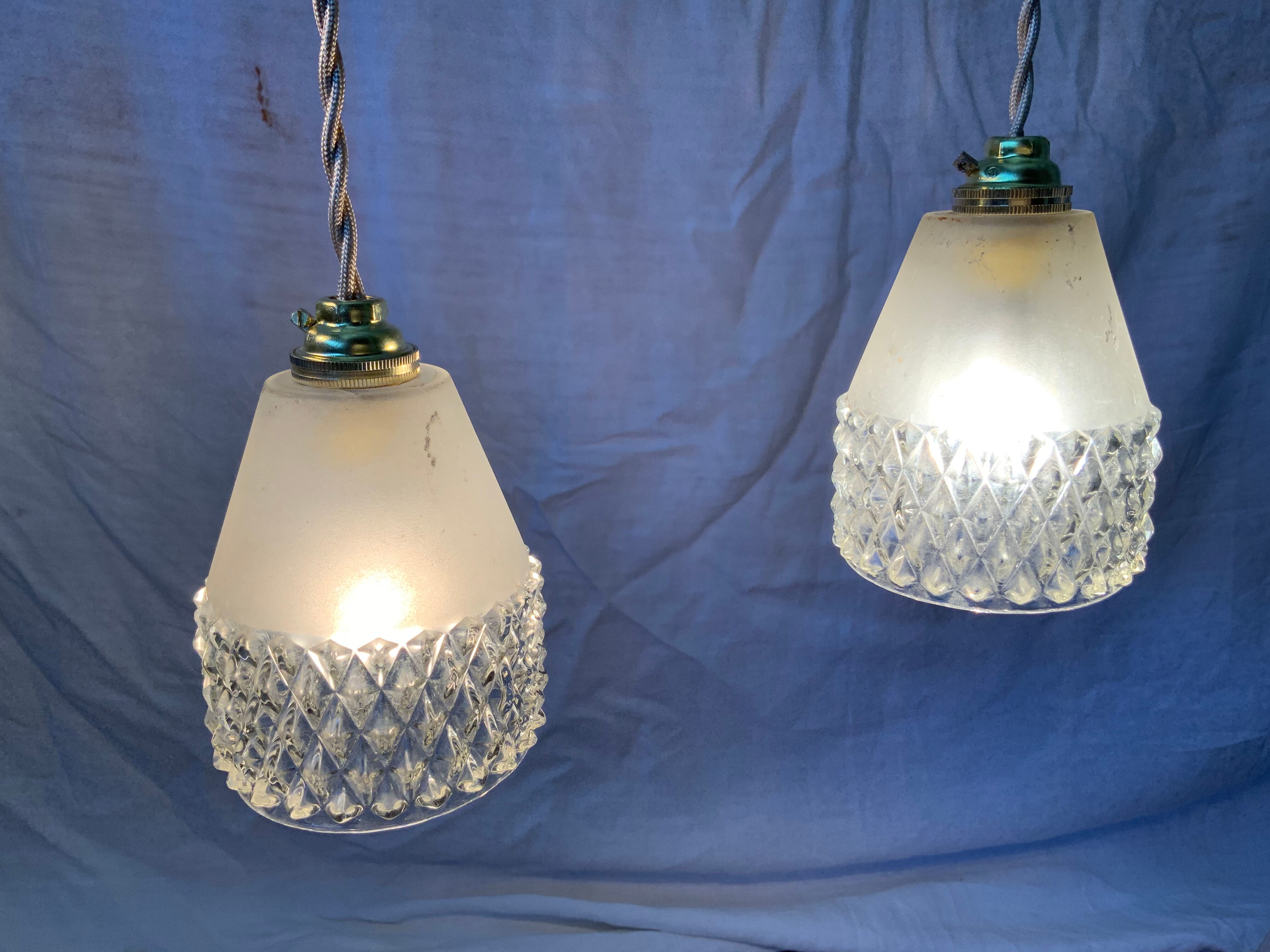 Trio of vintage suspensions