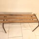 Old bench wooden slats and tubular metal base