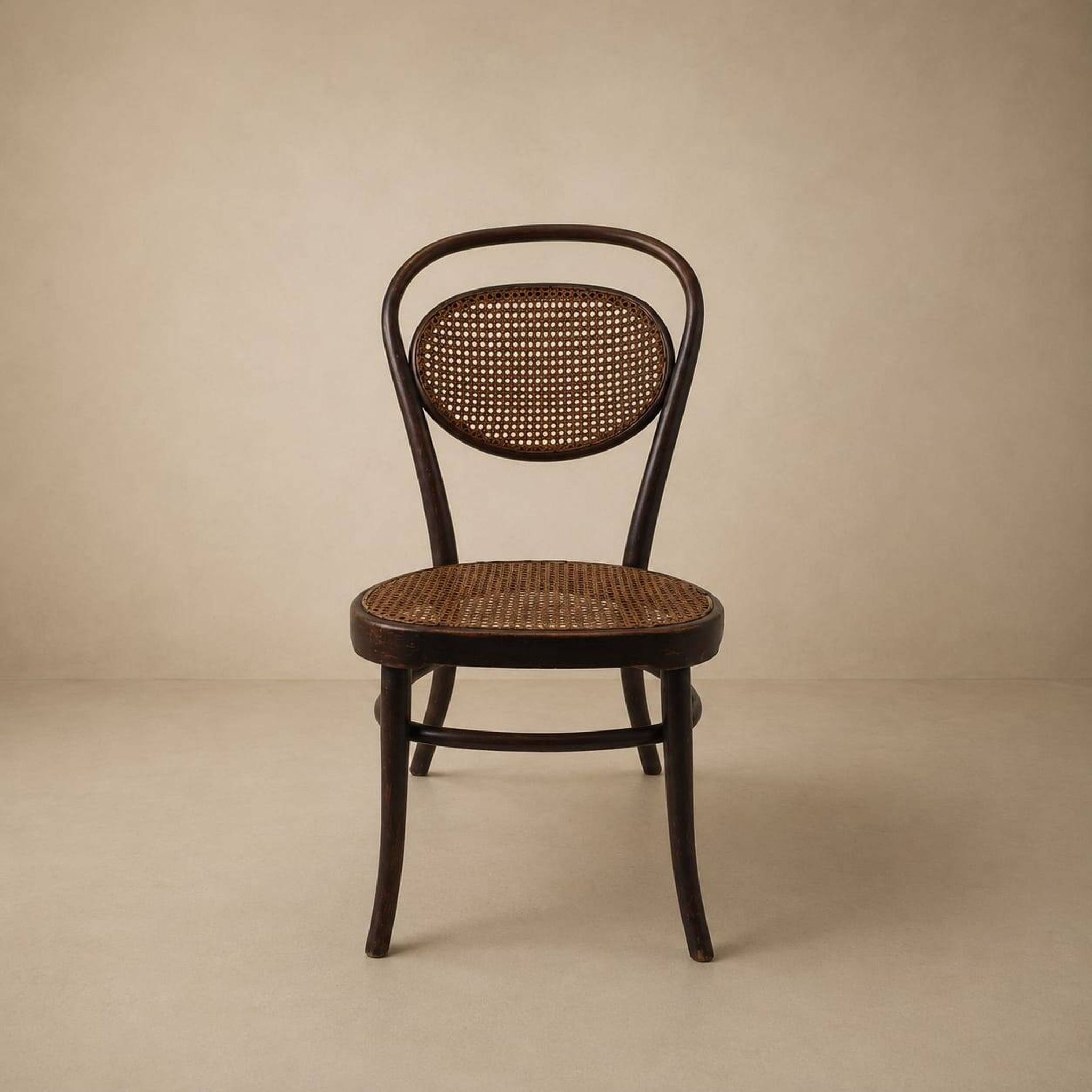Bentwood and cane nursing chair by J&J Kohn, 1910