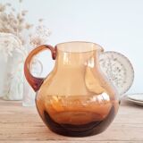 Antique amber glass pitcher