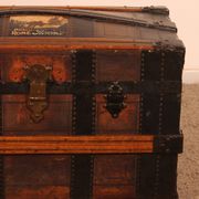 travel trunk from the early 20th century made of leather and wood