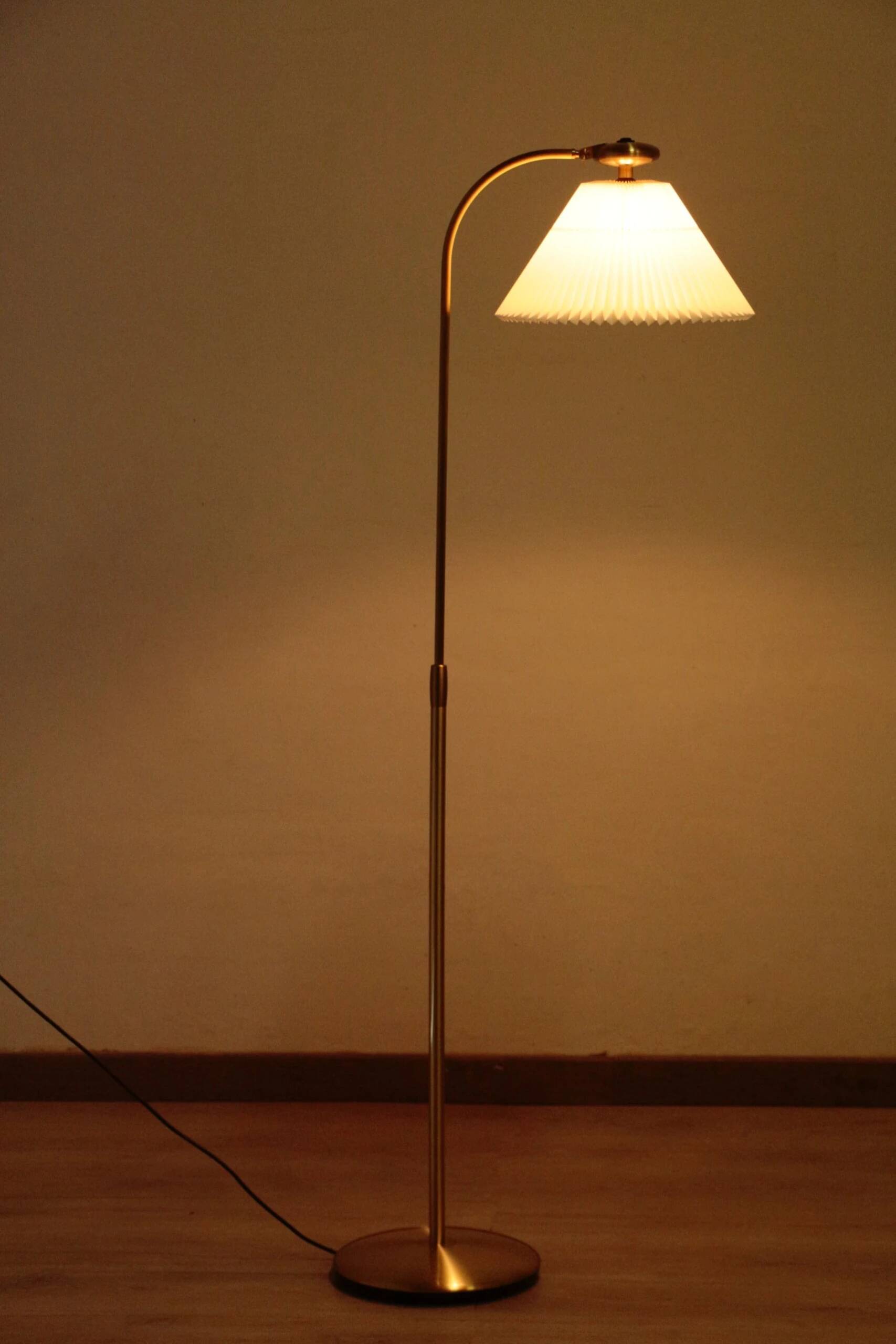Le Klint 340 floor lamp in brass – design by Philip Bro Ludvigsen