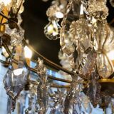 Large chandelier with tassels and old daggers
