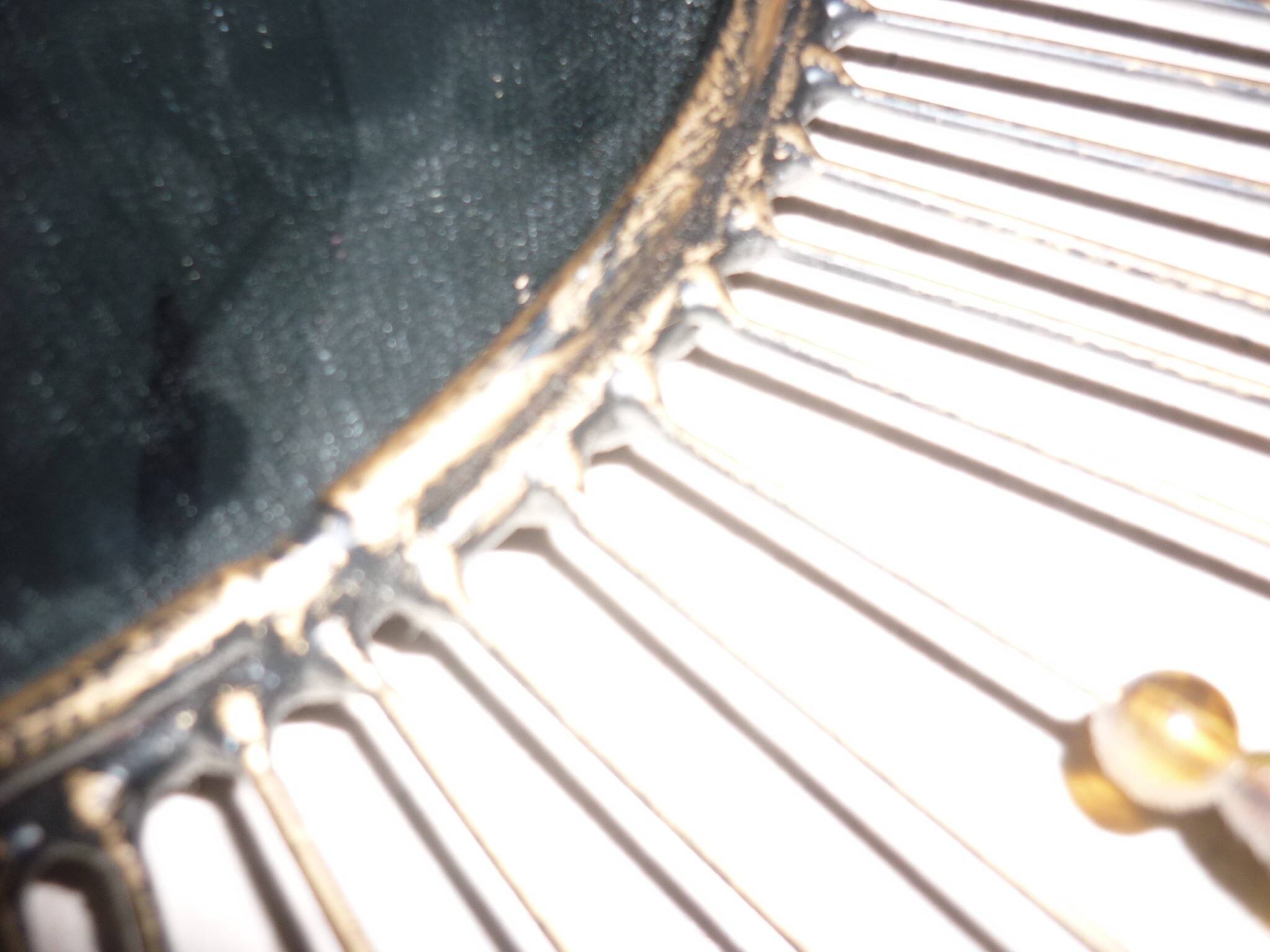 Round sun mirror with pearl rays and leaves