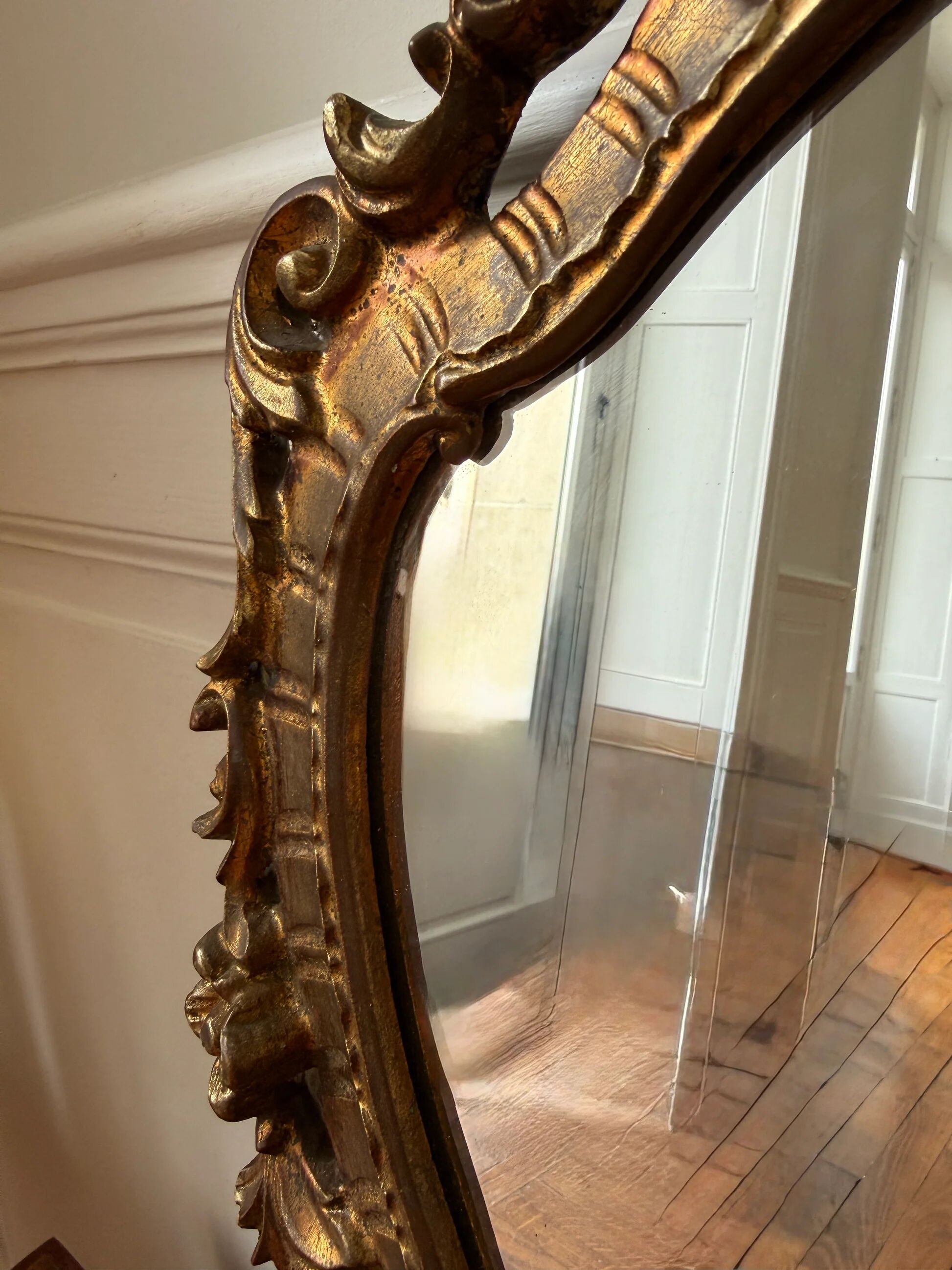 Golden rococo wall mirror