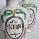 Pair of antique apothecary pots in glazed ceramic, decorated by hand