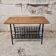 Vintage brutalist magazine rack