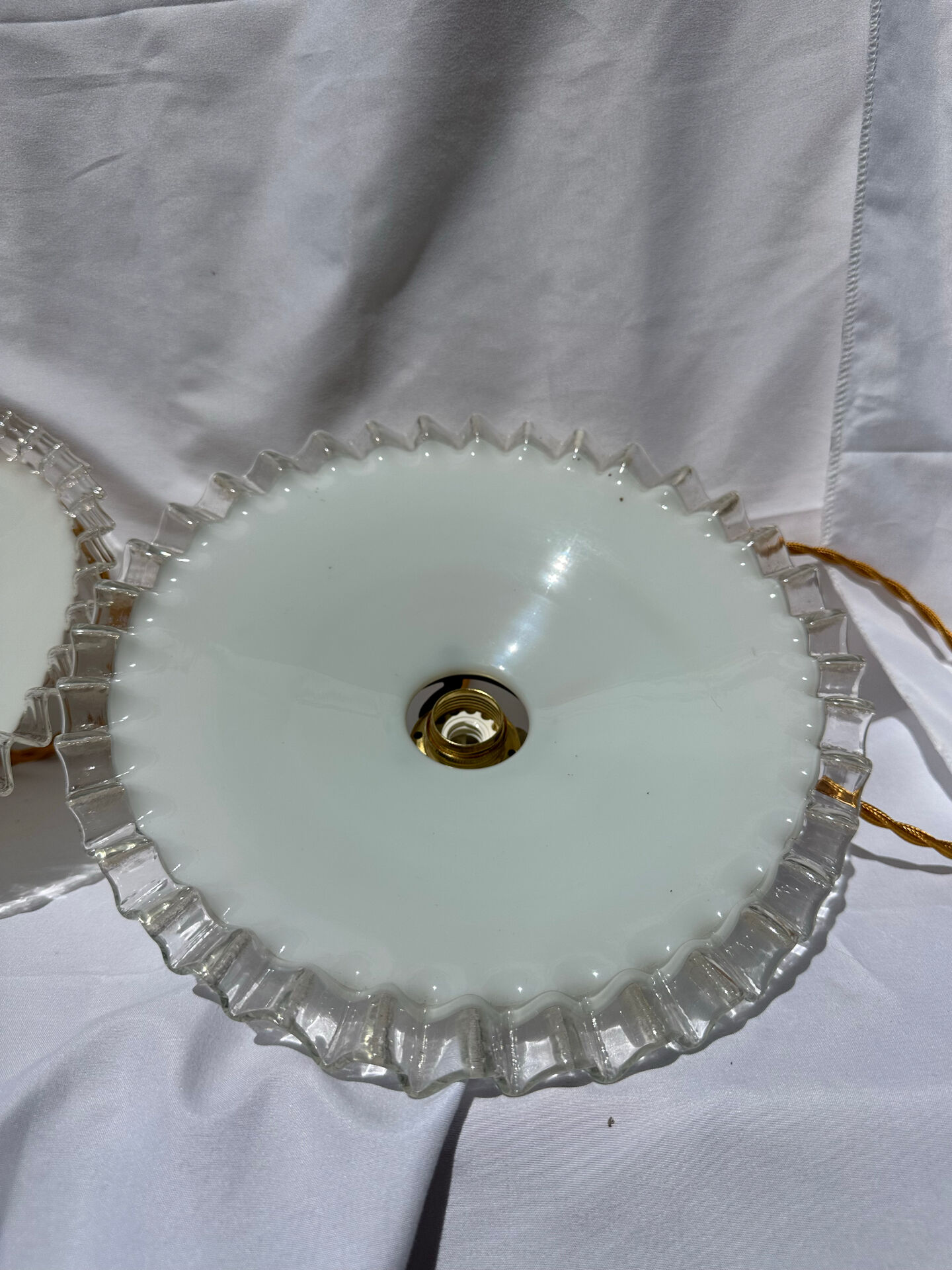 Vintage wavy opaline suspension pair with brass claw