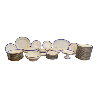 Service de table en porcelaine de Limoges à bandeau bleu sur fond blanc et or