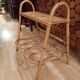 Small side piece of furniture with bamboo magazine holder, wooden top, 1960