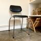 Chaise en aluminium chromé et skaï noir