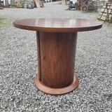 Vintage round oak coffee table with a door