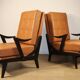 Paire de fauteuils vintage années 50 en bois noir et cuir caramel
