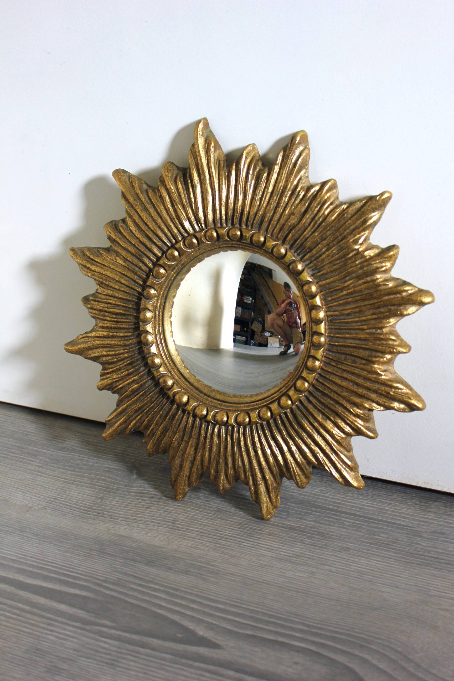 Golden sunburst convex vintage mirror from the 1960s.