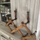 Wall-mounted accordion coat rack made of turned wood