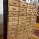 Large antique workshop cabinet with 44 drawers – patinated wood