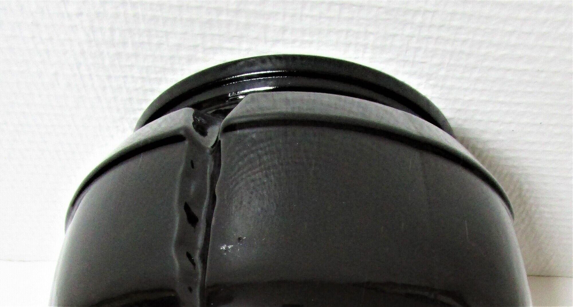 Champagne bucket design black glass in the shape of a 70s cork