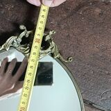 Antique mirror, oval with brass crest