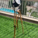 Floor lamp in the style of a cinema projector.