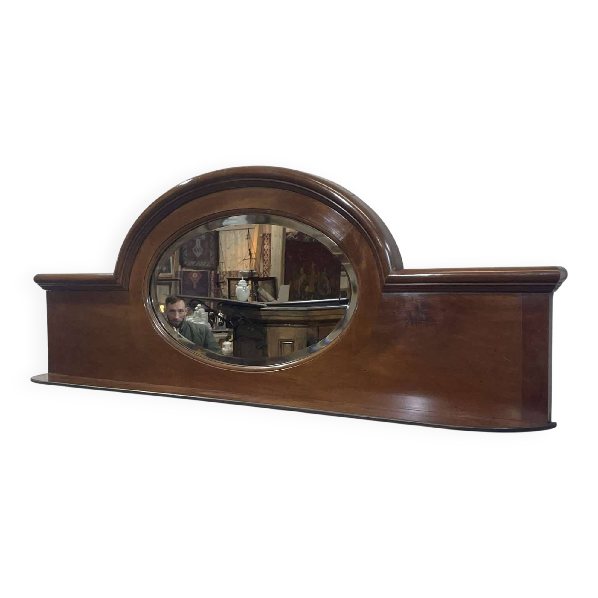English mahogany shelf with its bevelled mirror from the early 20th century.