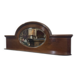 English mahogany shelf with its bevelled mirror from the early 20th century.