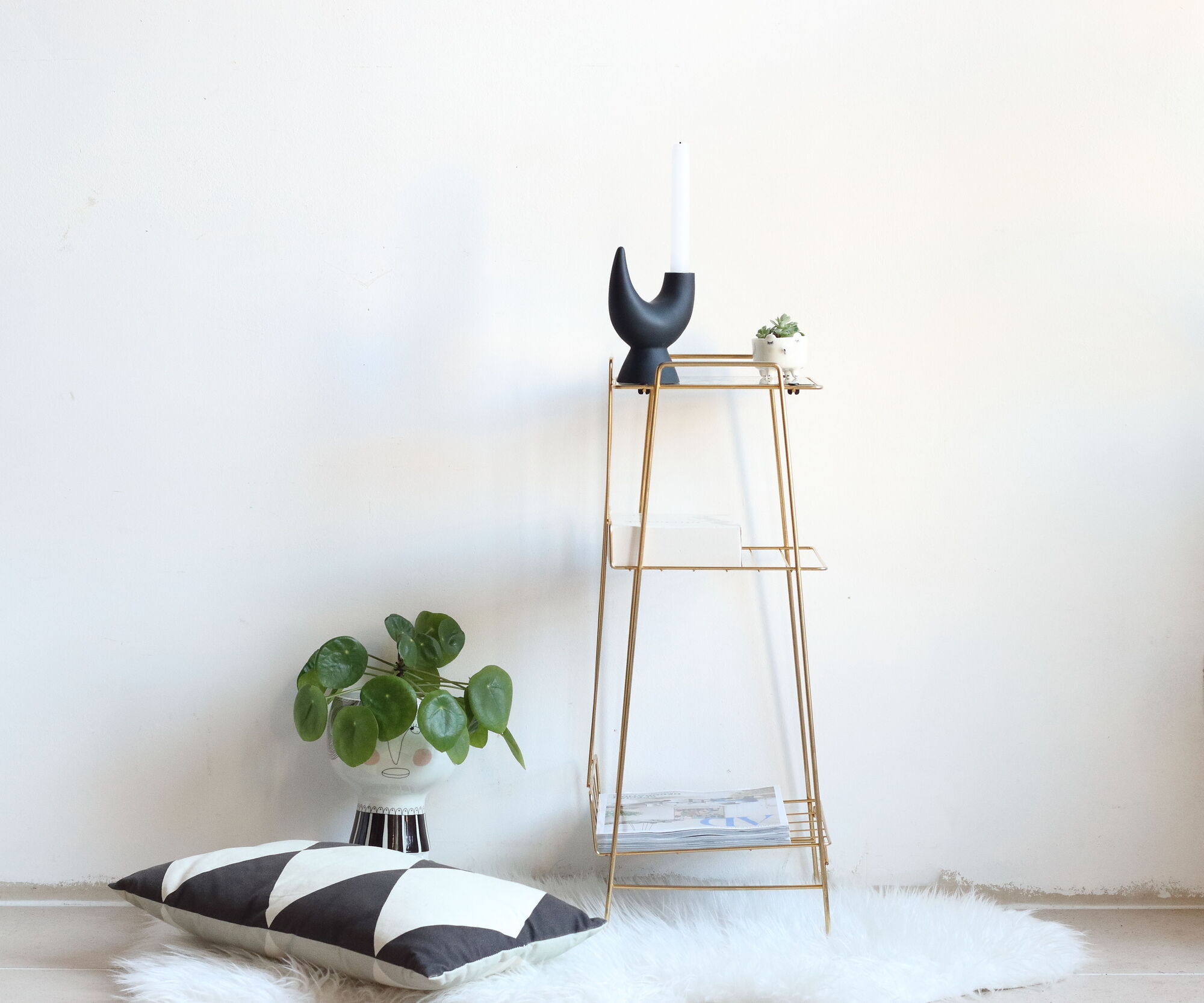 Side table in gilded brass