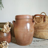 Old terracotta pot with lid