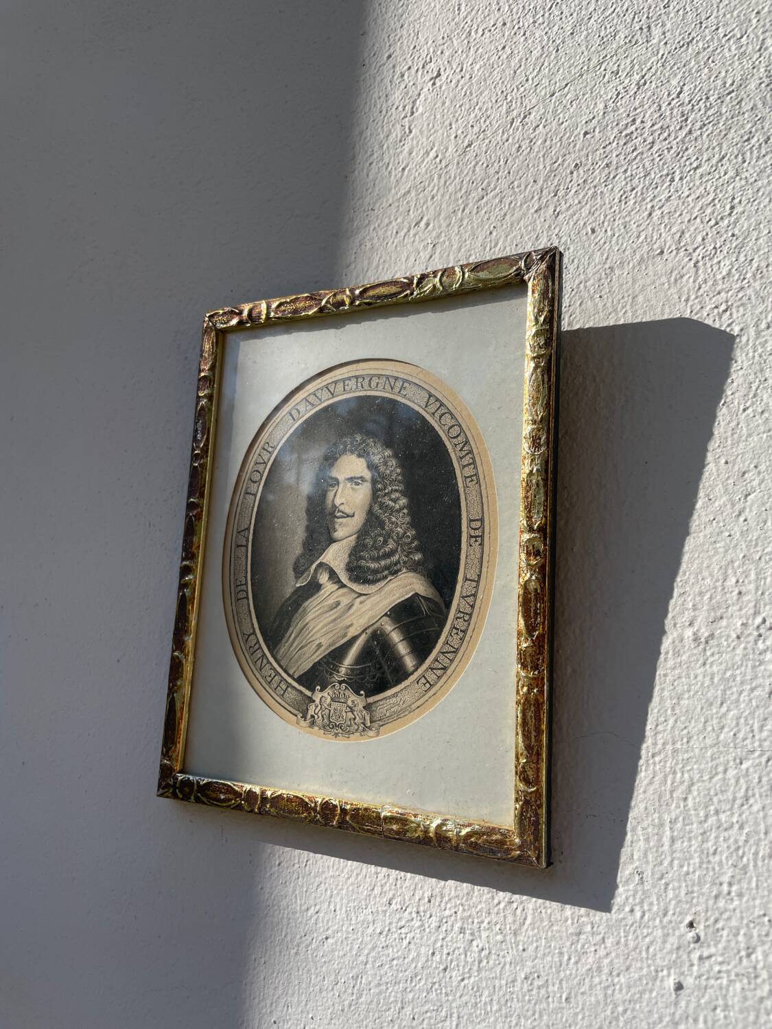 Classic antique man portrait in gilded frame