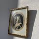 Classic antique man portrait in gilded frame