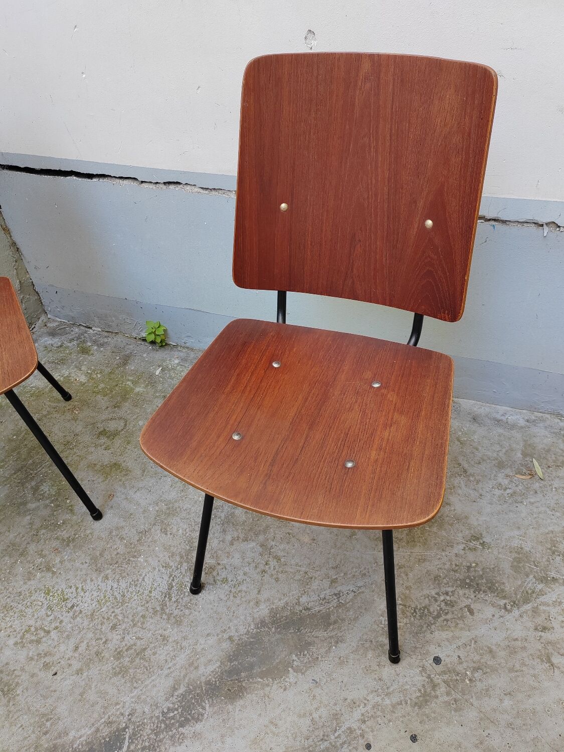 Pair of metal and teak chairs