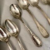 6 mismatched silver spoons