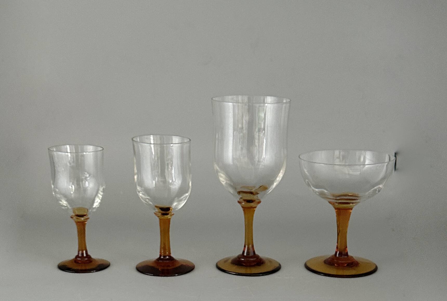 Set of 41 antique glasses with amber stems - water, wine, liqueur, champagne cups.