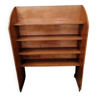 Vintage wooden bookcase on wheels