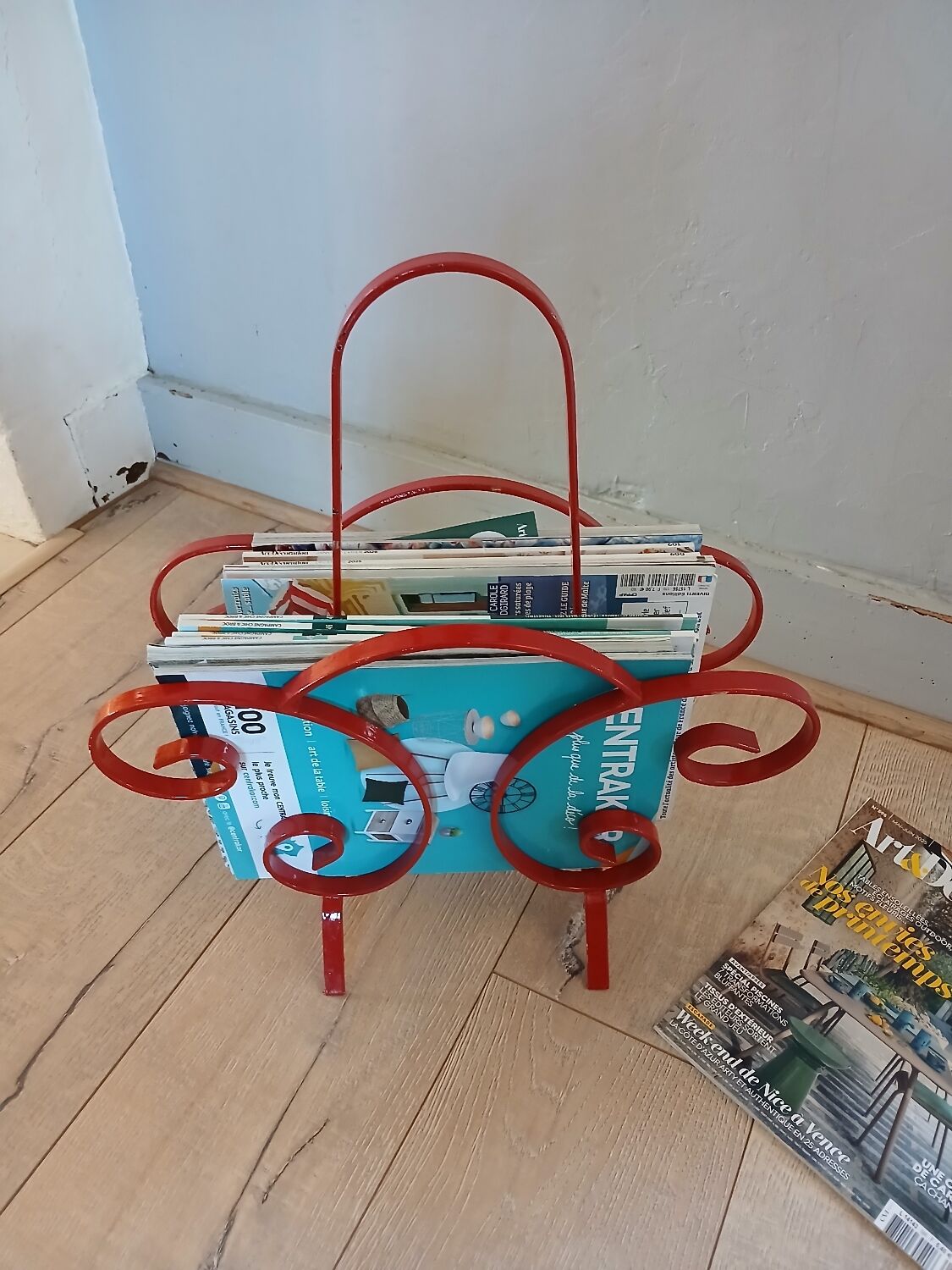 Vintage wrought iron magazine rack