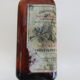 2 amber glass bottles with their old labels